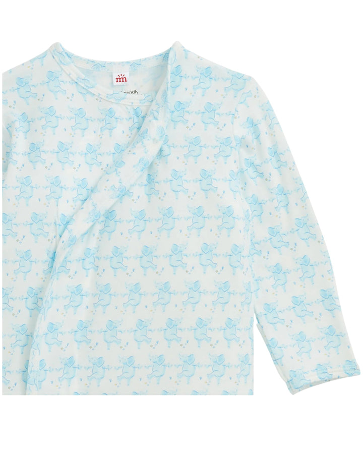 A long-sleeve baby wrap top in white with a light blue repeating pattern of cartoon characters, shown flat against a white background, that store