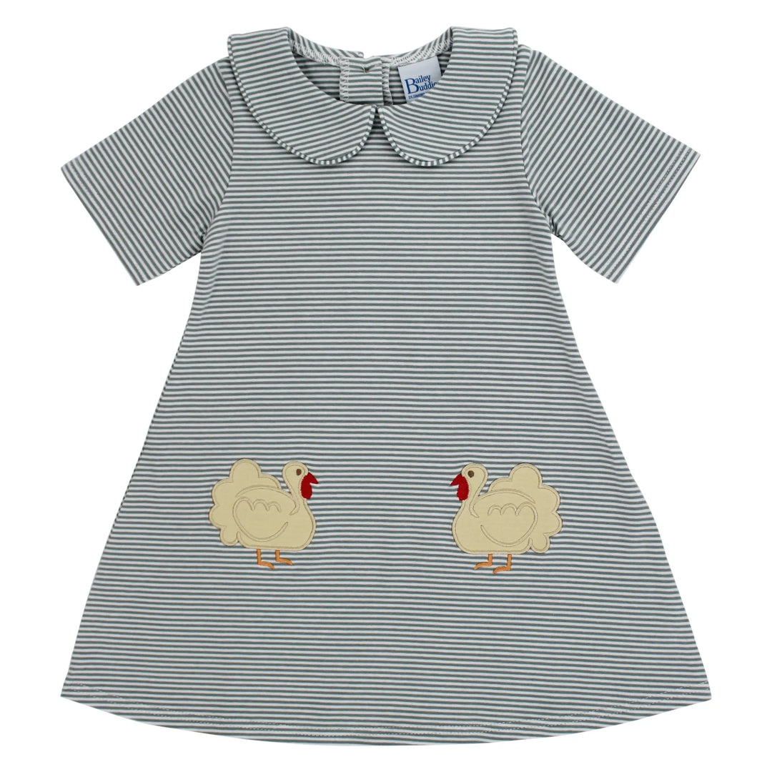 Striped dress with appliqué turkeys on a white background, that store, front