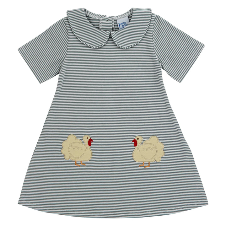 Striped dress with appliqué turkeys on a white background, that store, front