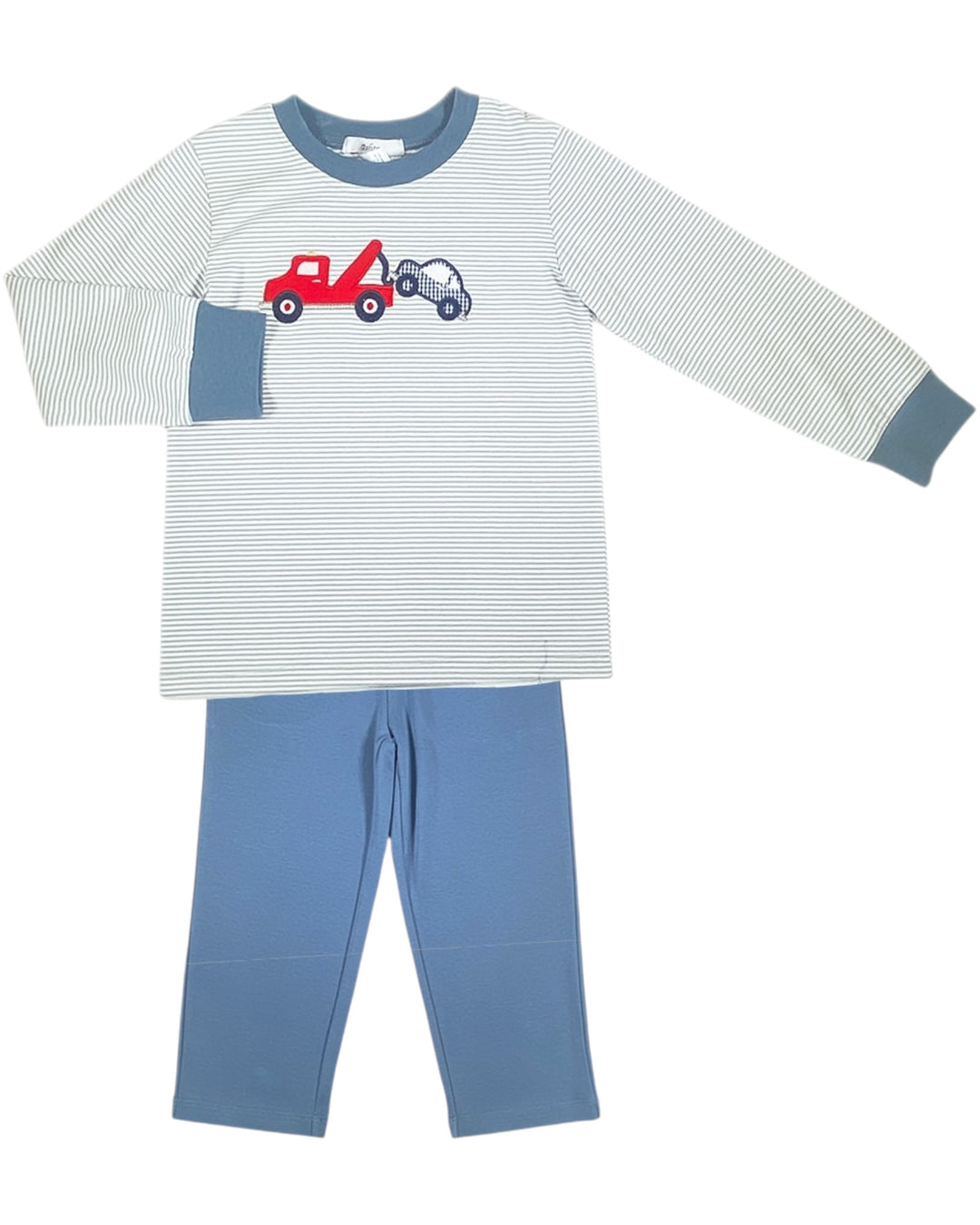 Children's pajama set with striped shirt and blue pants on a white background