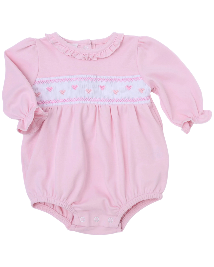 Pink baby romper with heart pattern on a white background