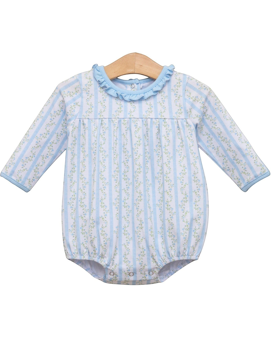 A baby long-sleeve romper with vertical light blue and white stripes, decorated with a delicate floral pattern, featuring a ruffled light blue collar and a wooden hanger, that store
