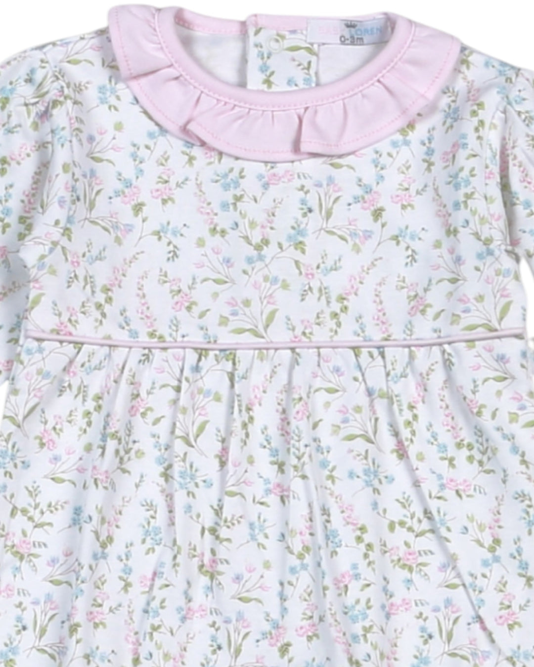 Floral-patterned dress with a pink collar on a white background