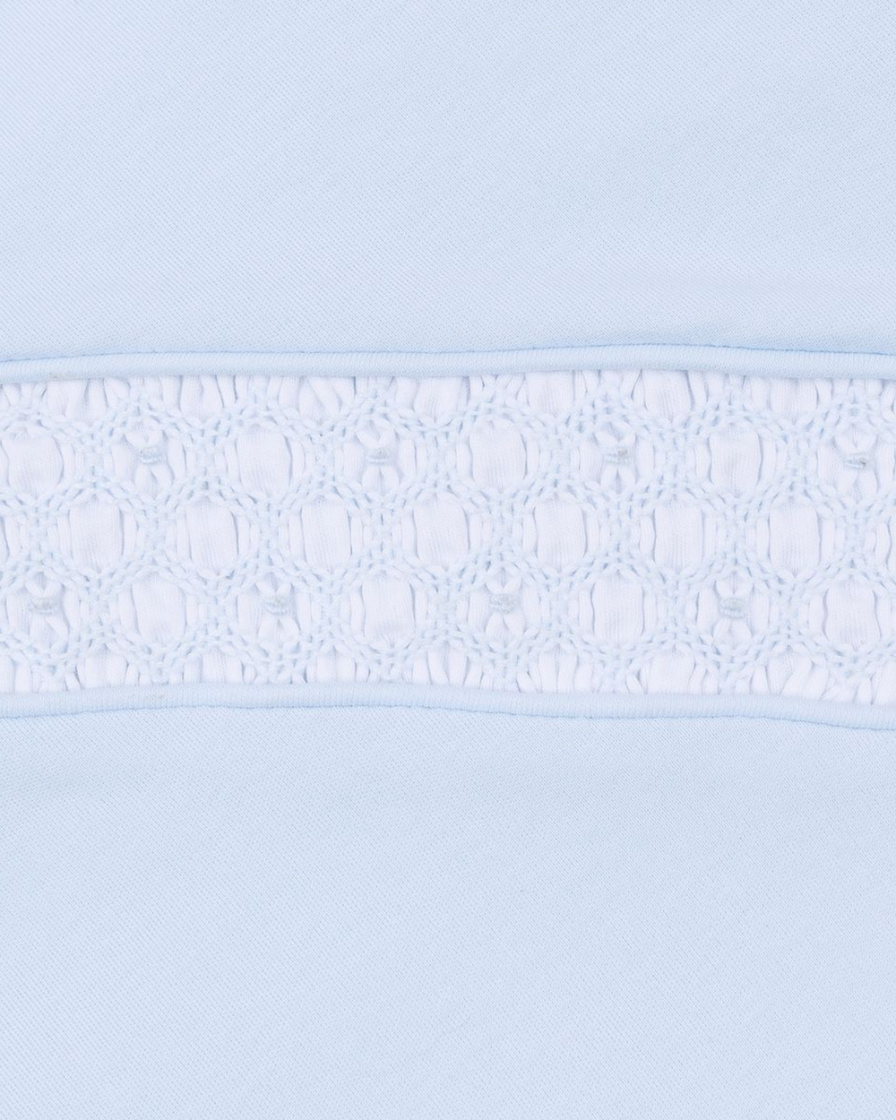 Light blue color swatch with a smocked subtle pattern