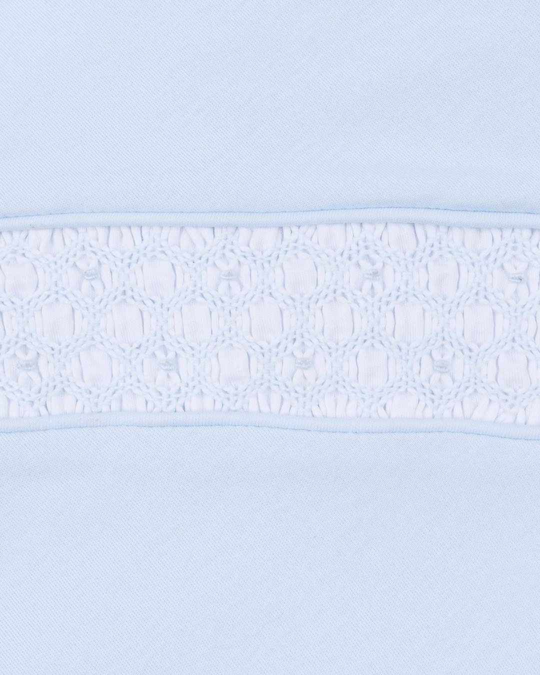 Light blue color swatch with a smocked subtle pattern