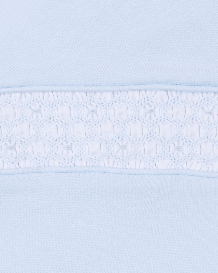 Light blue color swatch with a smocked subtle pattern