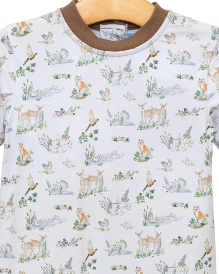 Children's t-shirt with forest animal pattern on a hanger
