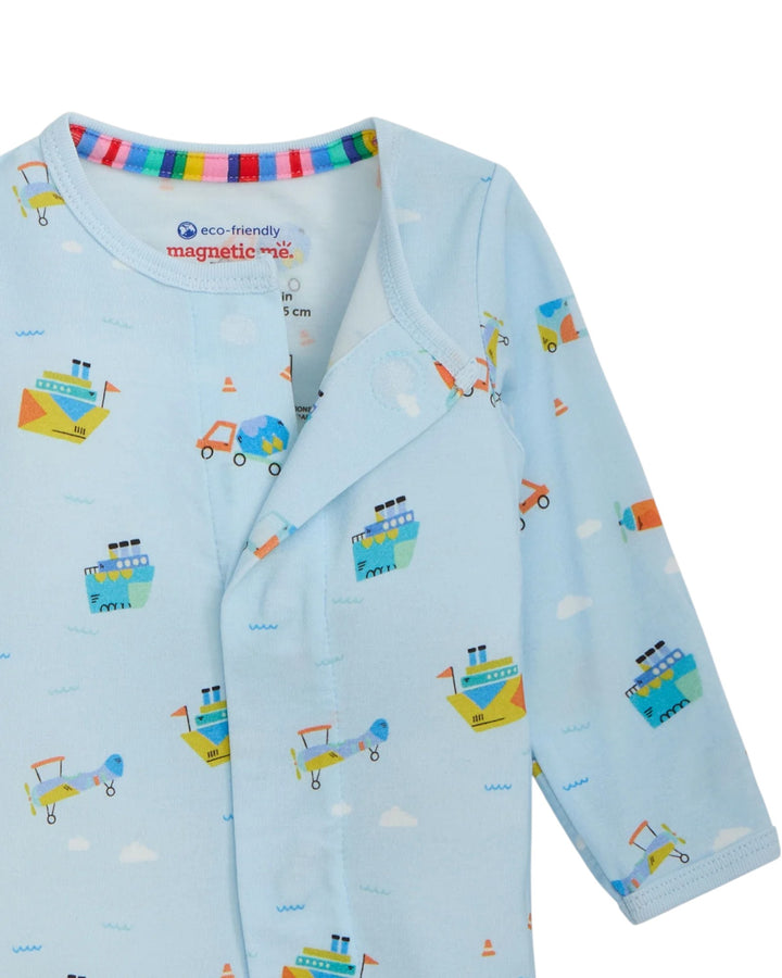 Children's long-sleeve shirt with vehicle patterns on a light blue background