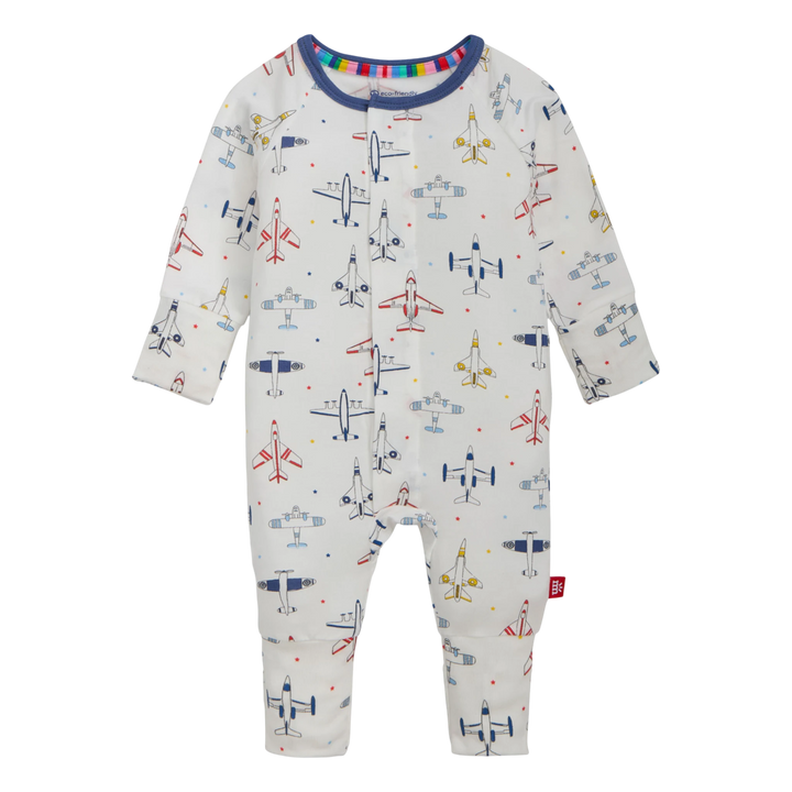 That Store Just Plane Fun modal convertible baby coverall with magnetic closures and airplane print on white fabric