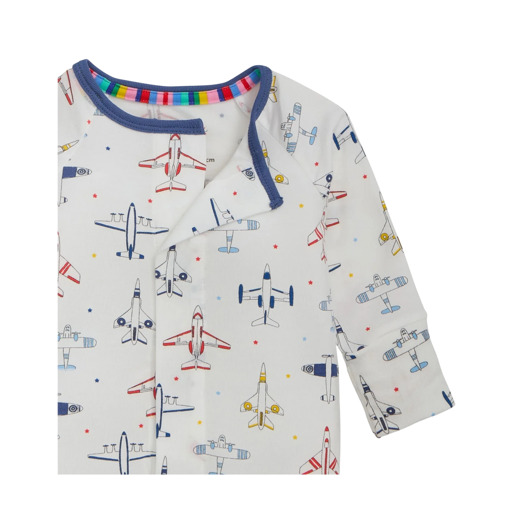 That Store modal convertible coverall in white with a colourful airplane print and blue trim detail