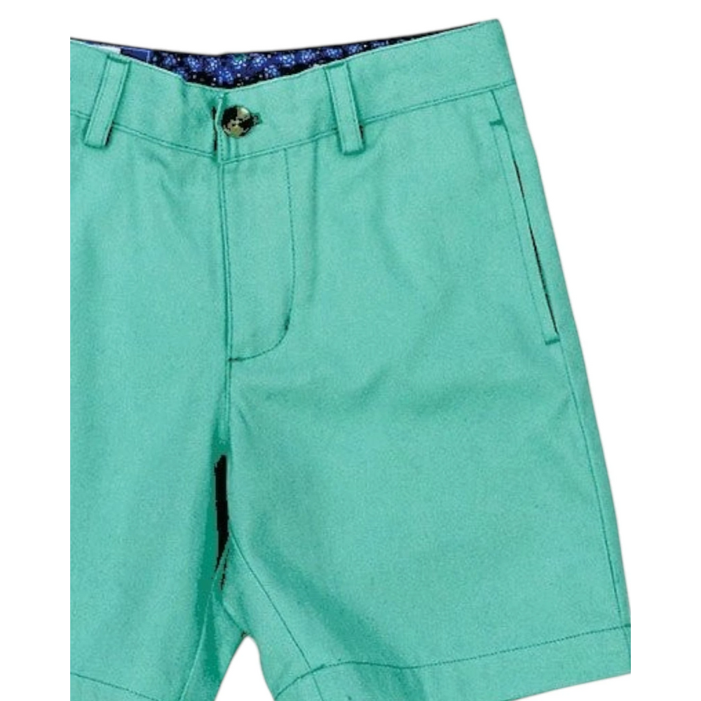 That Store J Bailey aloe green twill shorts featuring an adjustable waist tab and a patterned interior waistband.