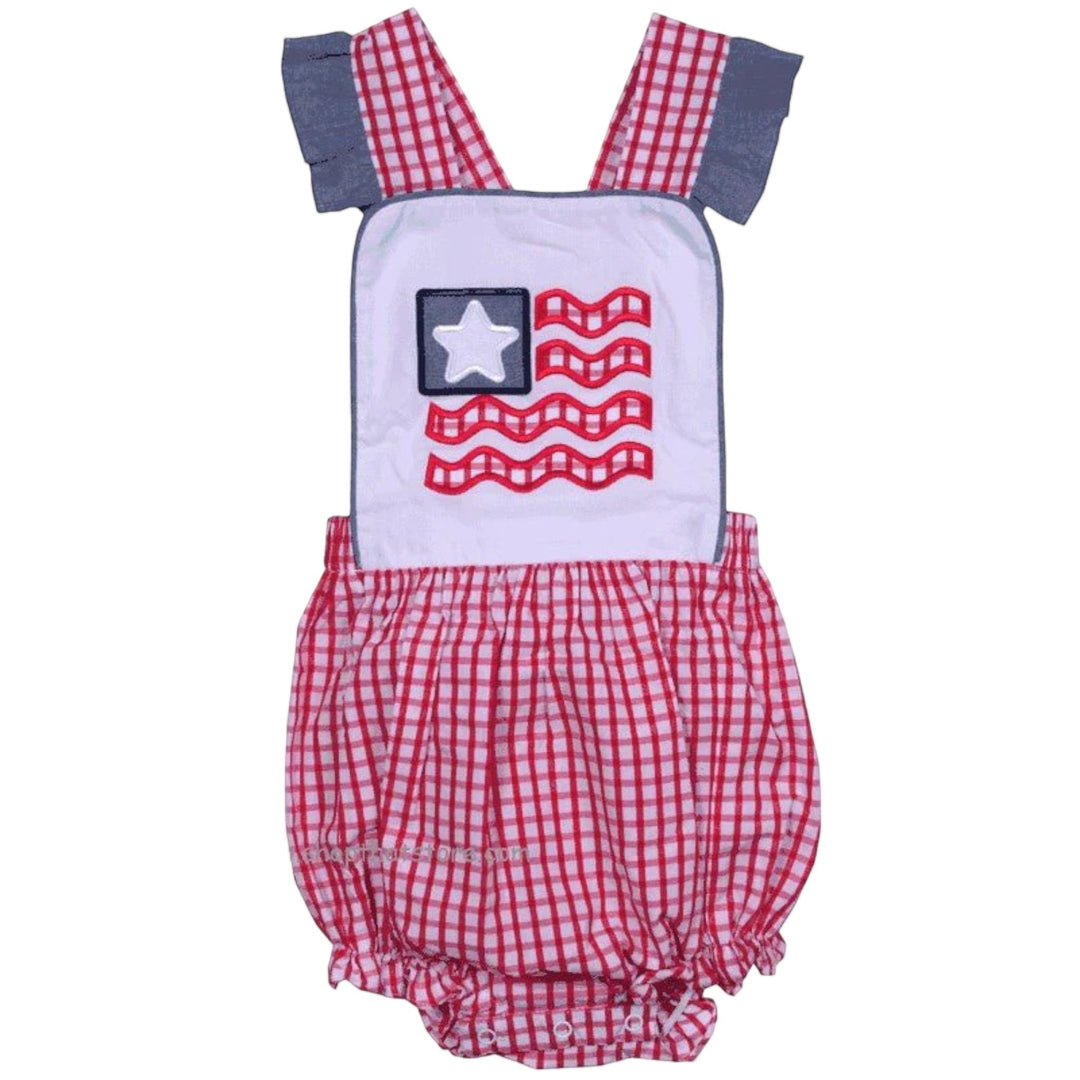 That Store girl's poly cotton bubble with American flag applique, red windowpane pattern, and chambray ruffle straps.