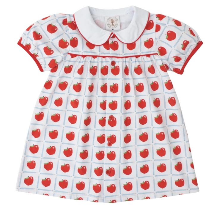That Store Teachers Pet dress featuring a white plaid background with red apple print and a classic Peter Pan collar.