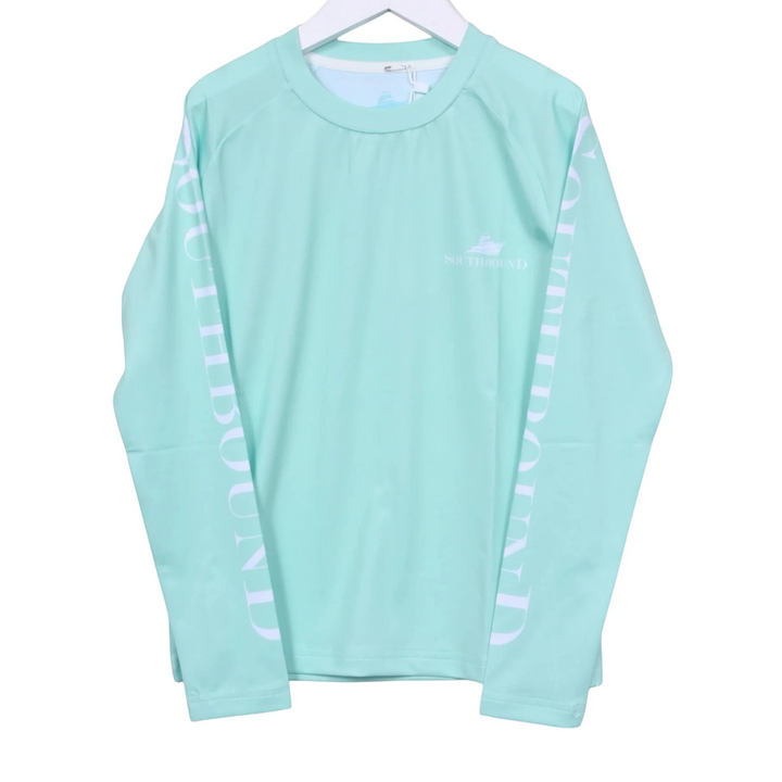 That Store boys aqua long sleeve performance swim tee with white logo and sleeve text on a white hanger
