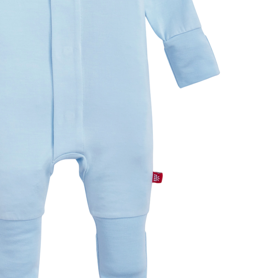 That Store baby blue modal convertible coverall with magnetic closures and extendable cuffs for easy dressing.