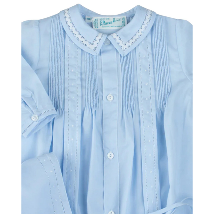 That Store baby boy blue take me home gown with pintuck bodice, lace trim, and hand embroidered dot details.