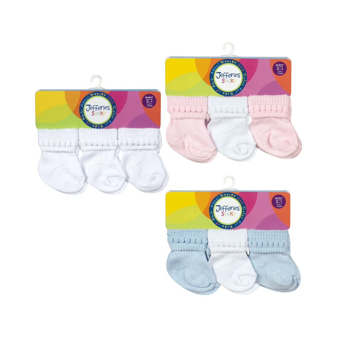 That Store baby socks in white, pink, and blue with bubble stitch cuffs, cotton-rich material, 6 pair pack.