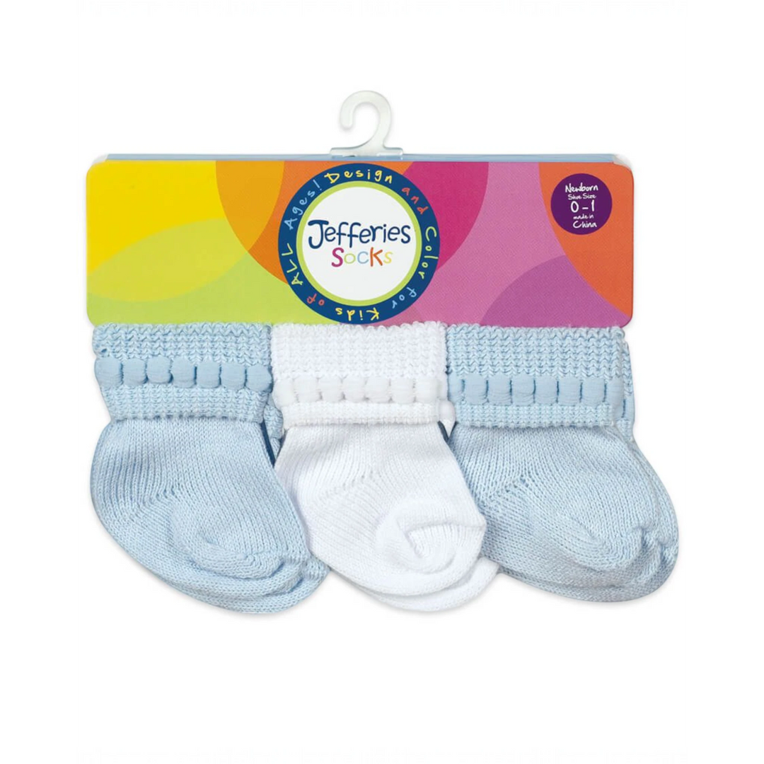 That Store baby socks in blue and white with bubble stitch cuffs, cotton-rich newborn booties in a 6-pair pack.