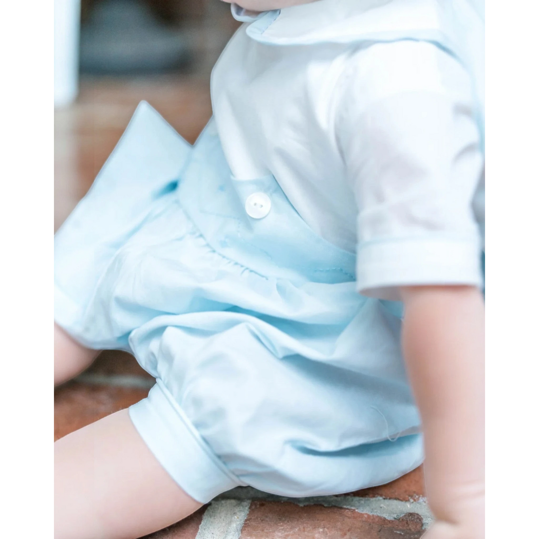 That Store baby boy bubble romper in light blue batiste fabric with white button details for special occasions