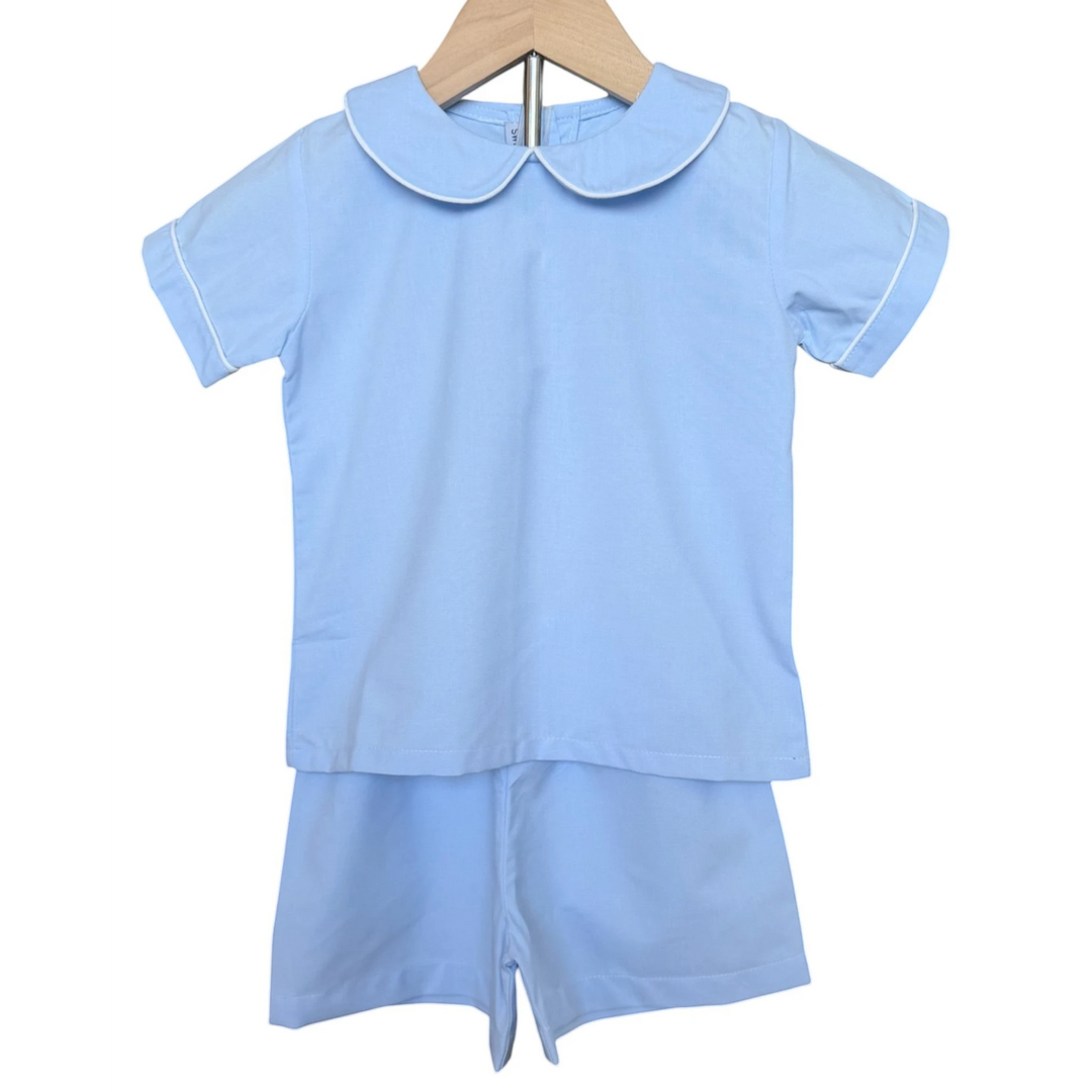 That Store blue short set for boys featuring a classic Peter Pan collar with white piping in cotton blend fabric.