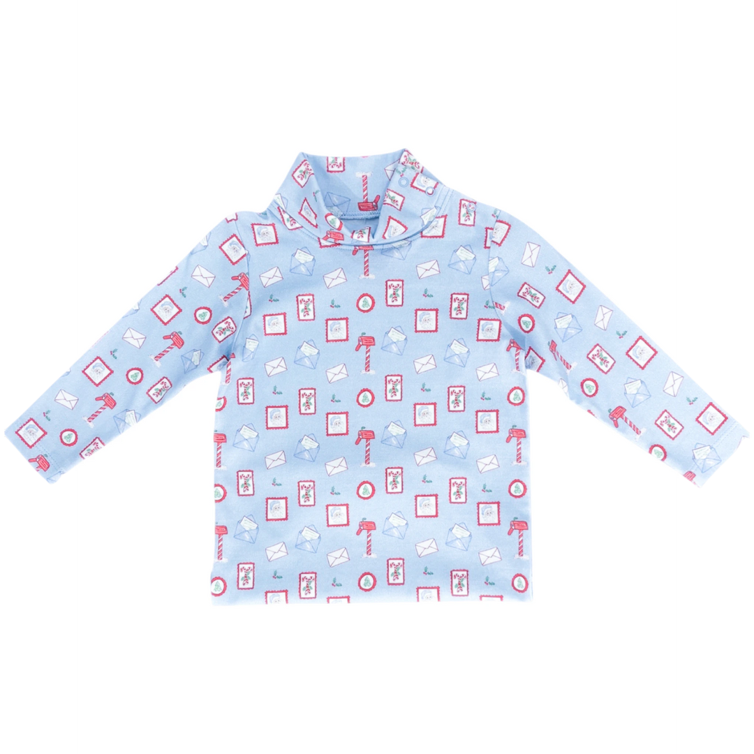 That Store blue turtleneck featuring a festive Christmas letters to Santa print for children