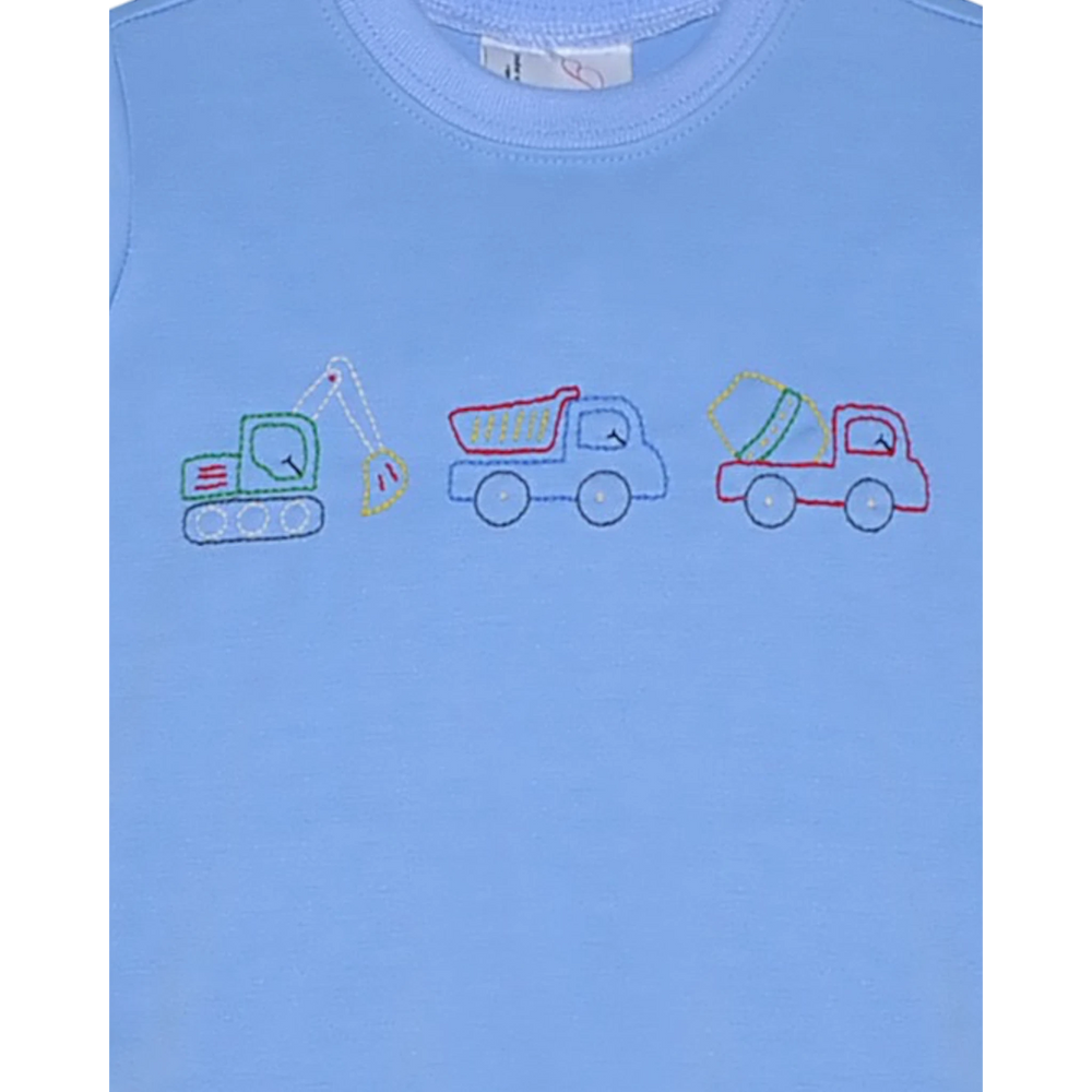 That Store blue boys shirt featuring embroidered construction trucks including an excavator, dump truck, and mixer.