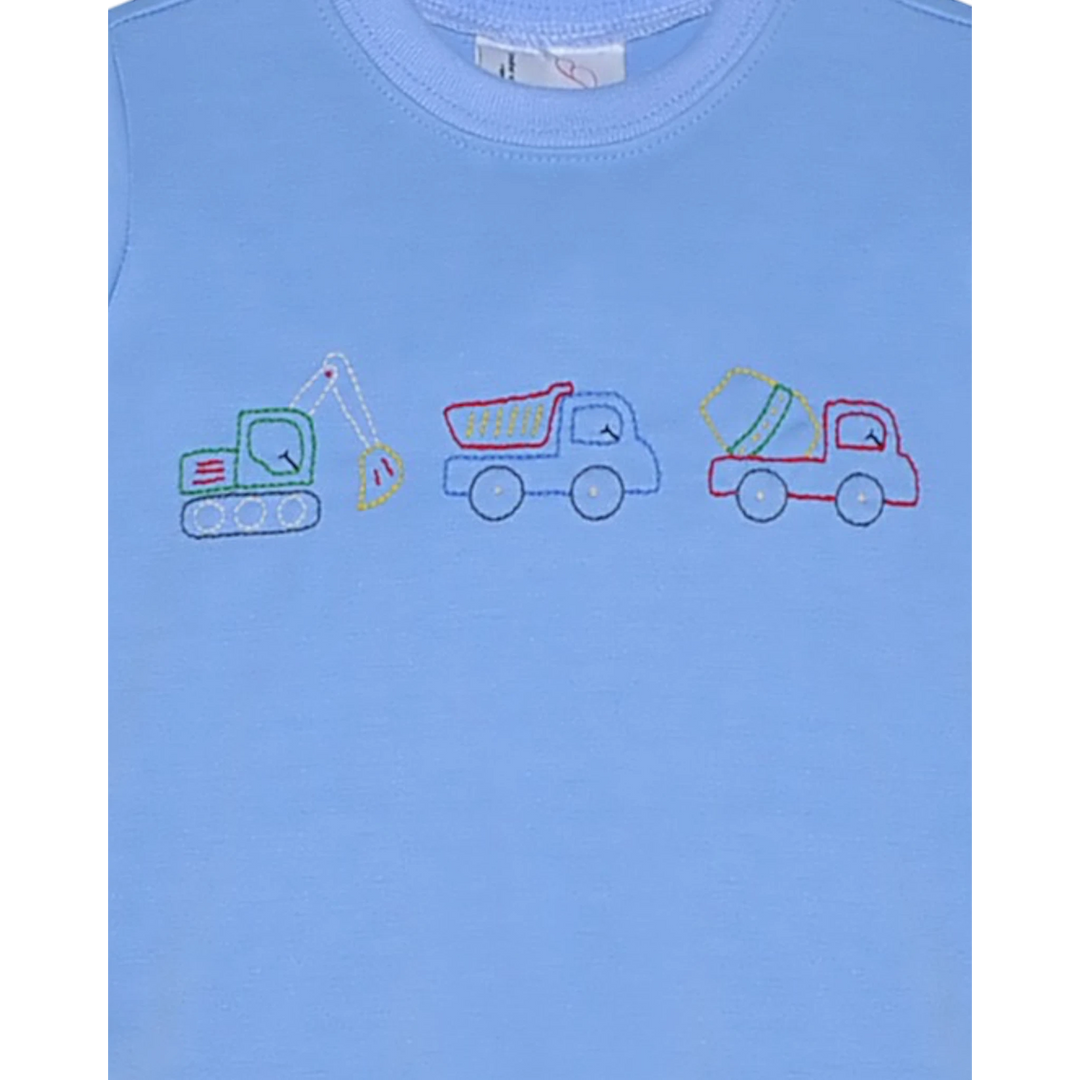 That Store blue boys shirt featuring embroidered construction trucks including an excavator, dump truck, and mixer.