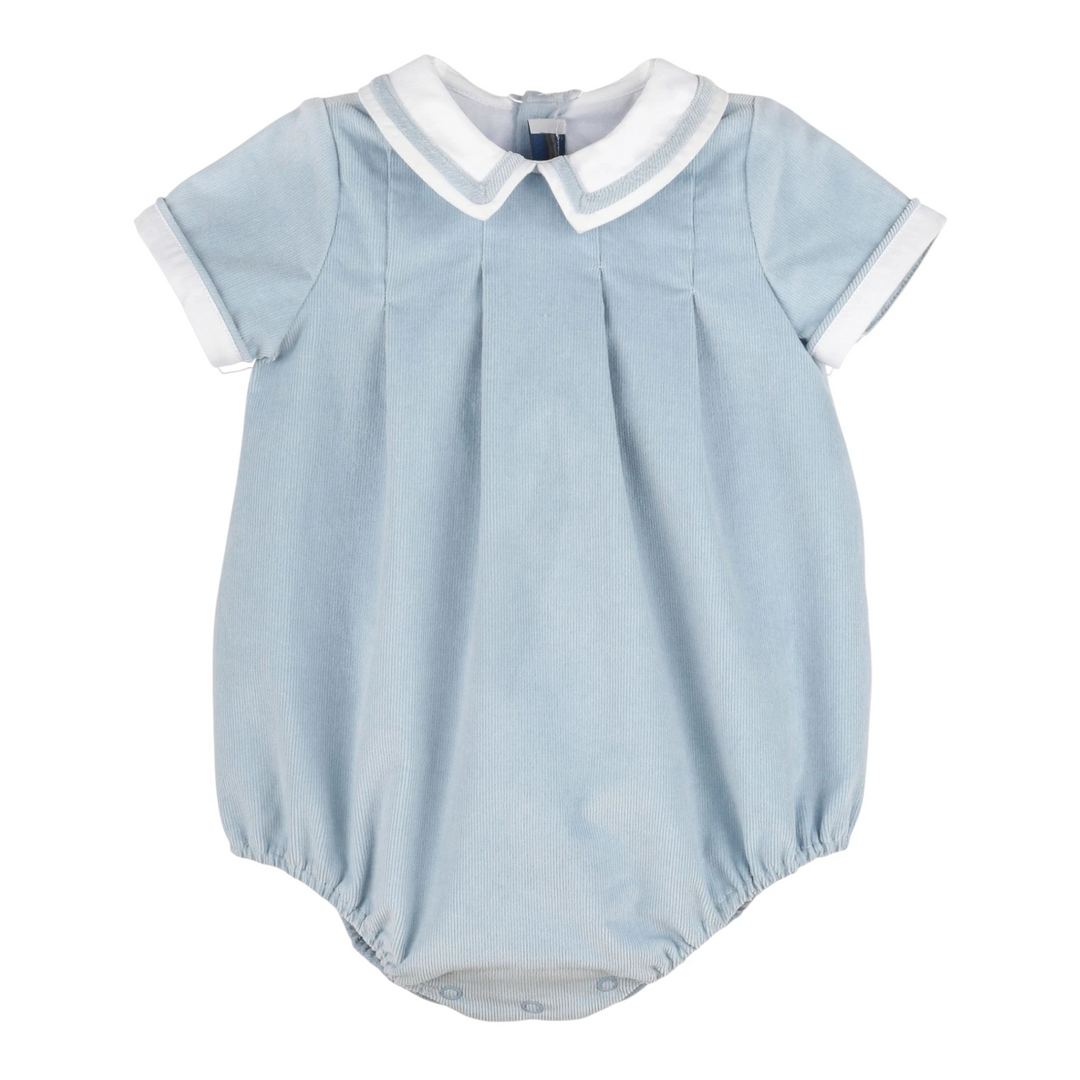 That Store baby boy vintage blue corduroy bubble romper with a white contrast collar and short sleeves.
