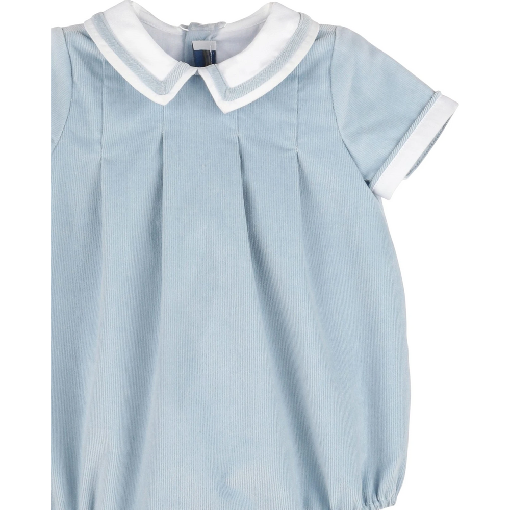 That Store baby boys vintage blue corduroy bubble with a white collar and pleated front detail.