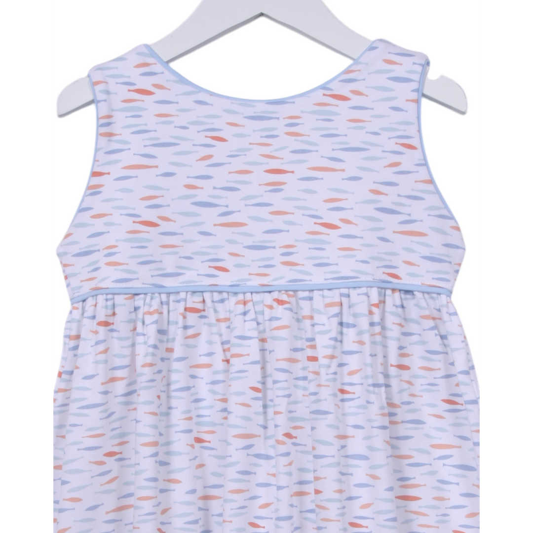 That Store girls dress in white Pima cotton with blue and orange fish print, blue piping, and back button closure.