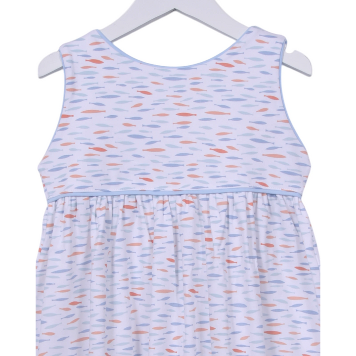 That Store girls dress in white Pima cotton with blue and orange fish print, blue piping, and back button closure.