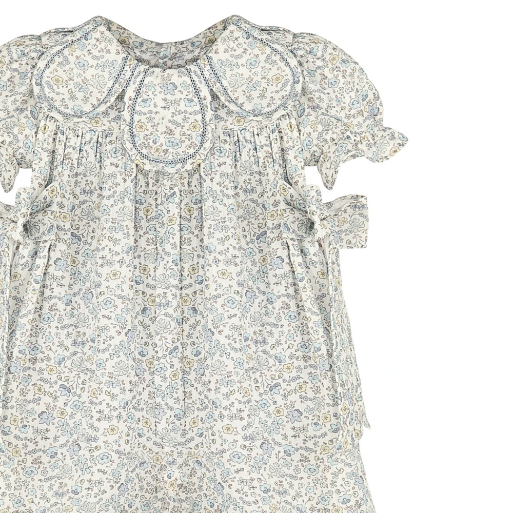 That Store blue floral longall for girls featuring a petal-inspired collar and delicate side bow details.