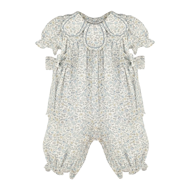 That Store girls blue floral longall featuring a petal-inspired collar and ruffled sleeves in a classic one-piece cut.