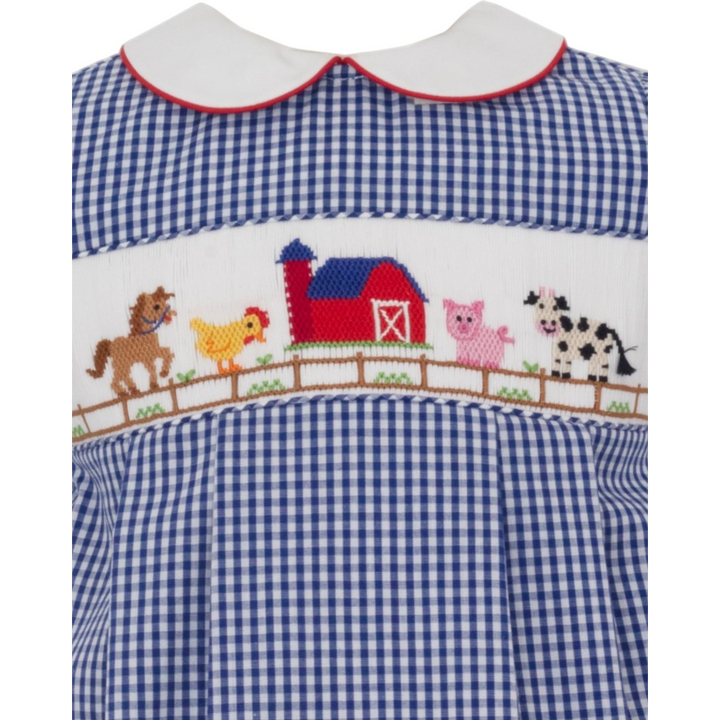 That Store boys blue gingham bubble with hand-smocked farm animal embroidery and a red-trimmed white collar