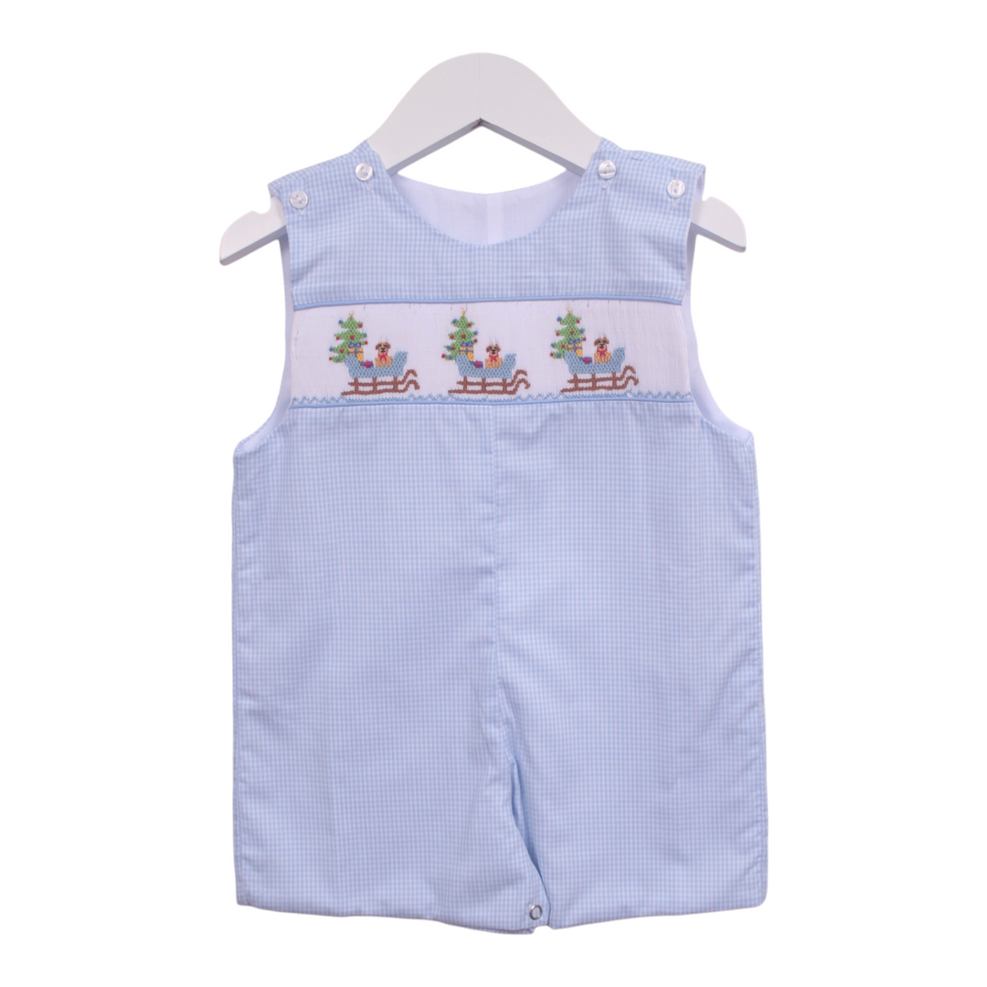 That Store boys blue gingham shortall featuring smocked puppy in a sleigh design for Christmas holiday wear