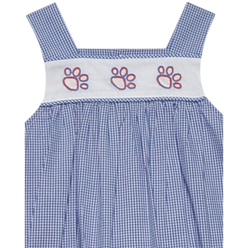 That Store blue gingham dress with white smocked chest and embroidered orange tiger paw details for young fans