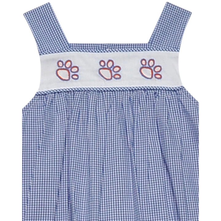 That Store blue gingham dress with white smocked chest and embroidered orange tiger paw details for young fans
