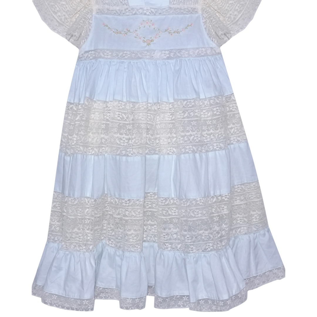 That Store Mary Frances blue cotton heirloom dress with intricate ecru lace panels and floral embroidery details.