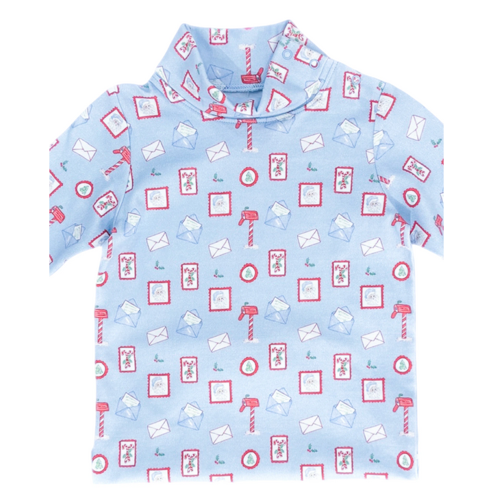 That Store light blue turtleneck featuring a festive Letters to Santa print with mailboxes, envelopes, and Santa.