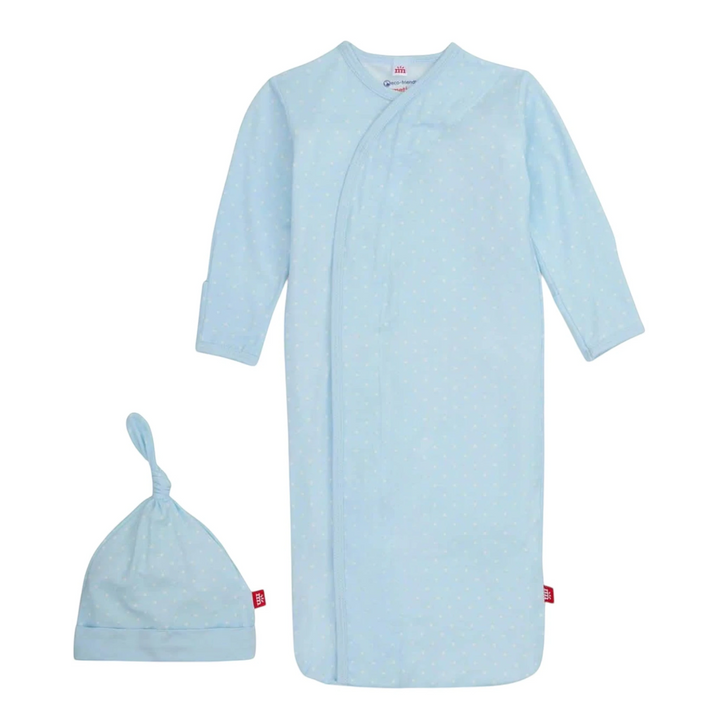 That Store baby gown and hat set in light blue modal fabric with white pin dot pattern and magnetic closures.