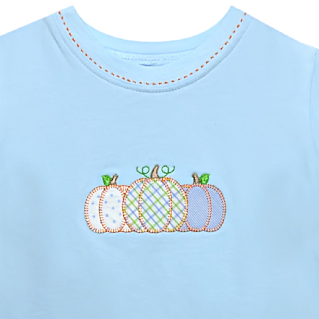 That Store boys light blue cotton shirt with three patterned pumpkin appliques for fall harvest season.