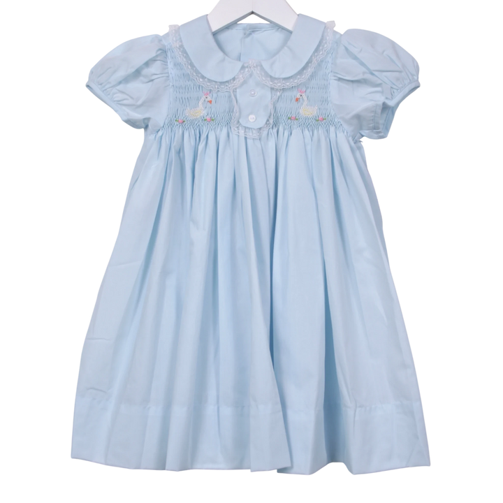 That Store light blue smocked dress with white lace collar and swan embroidery for little girls