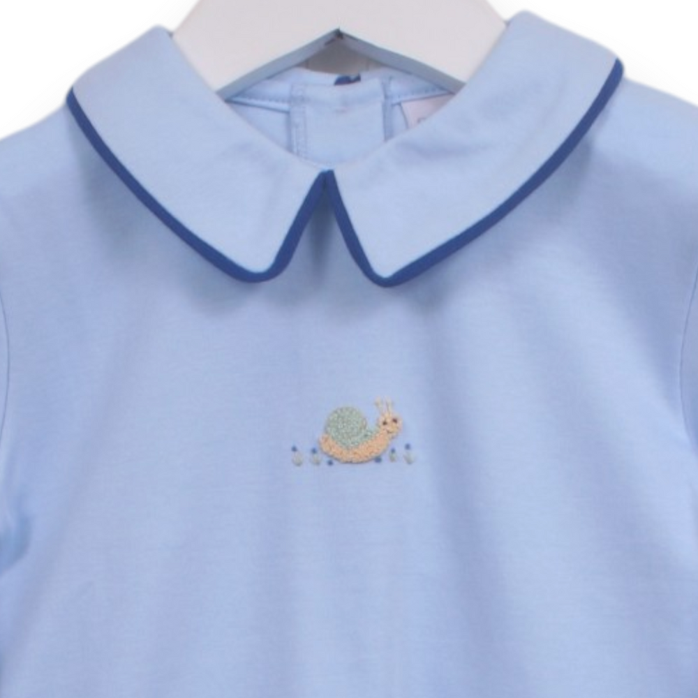 That Store blue Pima cotton baby boy shirt with a cute snail embroidery and a contrast navy blue peter pan collar.