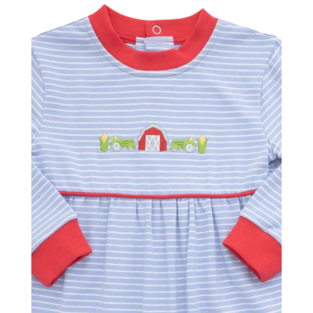 That Store blue striped boys romper with embroidered farm tractor and barn detail and red trim accents.