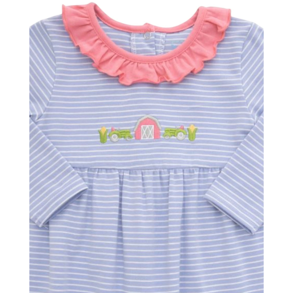 That Store girls blue striped romper featuring a pink ruffled collar and embroidered farm tractor and barn detail.