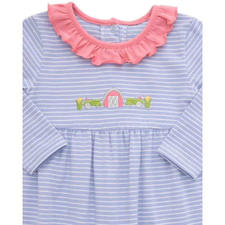 That Store girls blue striped romper featuring a pink ruffled collar and embroidered farm tractor and barn detail.