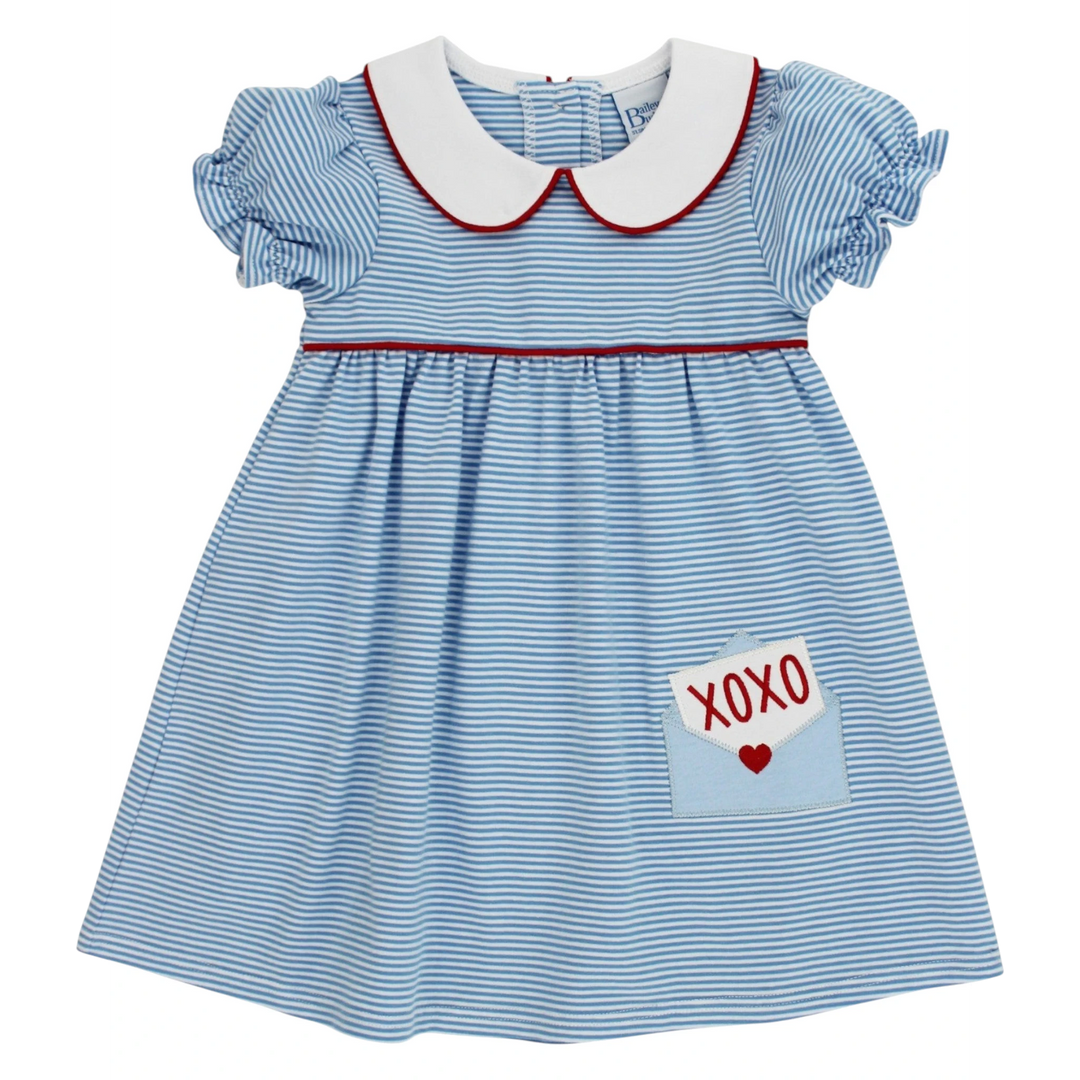 That Store blue and white striped knit dress with puff sleeves, Peter Pan collar, and XOXO envelope applique pocket.