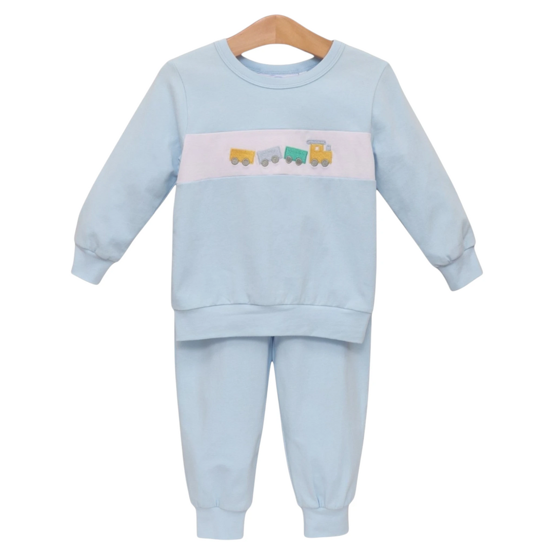 That Store light blue boys jogger set with an embroidered train motif on a white chest stripe
