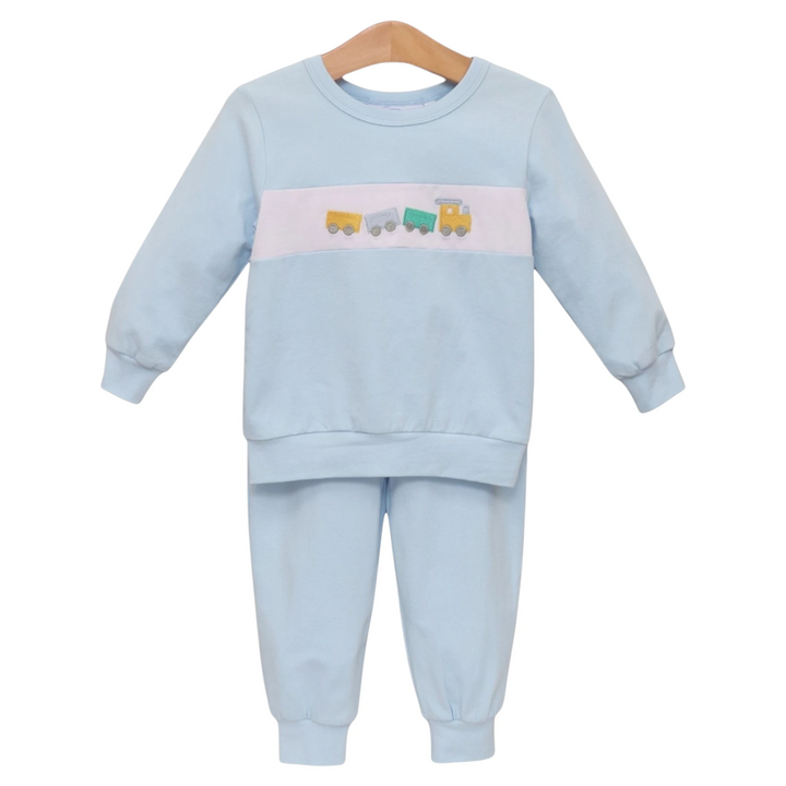 That Store light blue boys jogger set with an embroidered train motif on a white chest stripe