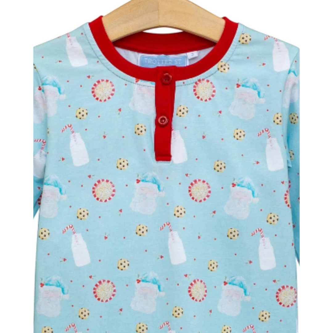 That Store boys lounge set featuring a blue Christmas print with Santa, milk, and cookies and red button placket.